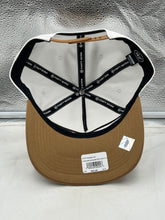 Load image into Gallery viewer, Lifestyle shot of a person wearing the Cleveland Cavaliers NBA '47 Brand White Two Tone Hitch Adjustable Snapback Hat while cheering at a basketball game.