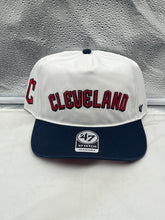 Load image into Gallery viewer, Cleveland Guardians MLB '47 Brand White TT Script Hitch Adjustable Snapback Hat displayed on a dark background, showcasing the unique script logo design.