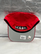 Load image into Gallery viewer, Nebraska Cornhuskers NCAA '47 Brand Red Hitch Adjustable Snapback Hat worn by a fan at a game, representing team pride and style.