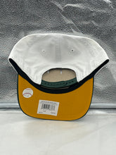 Load image into Gallery viewer, Model wearing the Oakland Athletics MLB '47 Brand White TT Script Hitch Adjustable Snapback Hat at a baseball game.