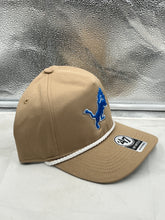 Load image into Gallery viewer, Detroit Lions NFL '47 Brand Khaki Rope Hitch Snapback Adjustable Hat modeled outdoors, highlighting its versatility for casual outings and game days.