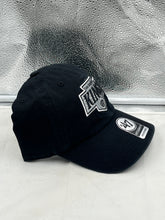 Load image into Gallery viewer, Los Angeles Kings NHL '47 Brand Clean Up Black Adjustable Hat displayed on a mannequin, showcasing its stylish design and iconic LA Kings logo.