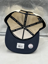 Load image into Gallery viewer, Atlanta Braves hat in action at a game, capturing the excitement of fans showing support with this stylish and functional snapback hat.