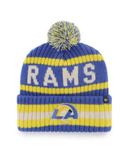 Load image into Gallery viewer, Los Angeles Rams NFL '47 Brand Winter Beanie Knit Ski Cap Hat displayed in a stylish setting, showcasing its vibrant team colors and iconic Rams logo, perfect for keeping warm during chilly game days.