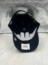 Load image into Gallery viewer, Lifestyle image of a fan wearing the Vanderbilt Commodores NCAA '47 Brand Black Clean Up Adjustable Strapback Hat at a tailgate, representing team spirit.