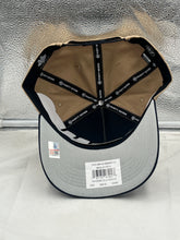 Load image into Gallery viewer, Tennessee Volunteers NCAA '47 Throwback Khaki TT Hitch Snapback Adjustable Hat worn by a fan at a football game, showing team spirit.