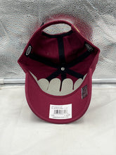 Load image into Gallery viewer, Arizona Coyotes NHL '47 Brand Throwback Red Clean Up Adjustable Strapback Hat worn outdoors, demonstrating its vintage-inspired style and team spirit for fans.