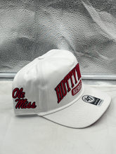 Load image into Gallery viewer, Model wearing the Ole Miss Rebels NCAA '47 Brand Hotty Toddy White Hitch Adjustable Snapback Hat outdoors, representing team spirit on game day.