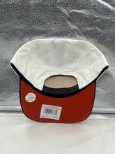 Load image into Gallery viewer, Person wearing the San Francisco Giants MLB '47 Brand White TT Script Hitch Adjustable Snapback Hat at a baseball game, showcasing team spirit and comfortable fit.