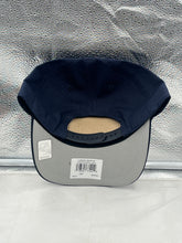 Load image into Gallery viewer, Model wearing the Toronto Maple Leafs NHL '47 Navy Script Hitch Rope Adjustable Snapback Hat, displaying team pride at a casual outing.