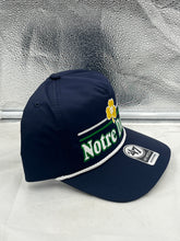 Load image into Gallery viewer, Notre Dame Fighting Irish NCAA '47 Brand Navy Rope Script Hitch Adjustable Hat worn by a fan at a game, demonstrating its comfort and team spirit.