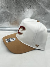 Load image into Gallery viewer, Side view of the Cleveland Cavaliers NBA '47 Brand White Two Tone Hitch Adjustable Snapback Hat illustrating the two-tone color scheme.