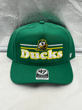 Load image into Gallery viewer, Oregon Ducks NCAA '47 Brand Green Hitch Adjustable Snapback Hat showcasing the iconic team logo, perfect for fans wanting to display their loyalty and style.