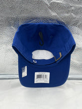 Load image into Gallery viewer, Vancouver Canucks NHL '47 Brand Blue Clean Up Adjustable Strapback Hat displayed at a stylish angle, emphasizing the adjustable strapback design.