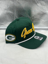 Load image into Gallery viewer, Side view of the Green Bay Packers NFL '47 Brand Green Script Rope Hitch Snapback Adjustable Hat highlighting the adjustable snapback feature and the iconic Packers script logo.