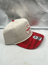 Load image into Gallery viewer, Side profile of the Carolina Hurricanes NHL '47 Tan TT Fiji Hitch Adjustable Snapback Hat displaying the adjustable snapback feature.