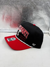 Load image into Gallery viewer, Side view of the Cincinnati Bearcats NCAA '47 Black Two Tone Hitch Rope Adjustable Snapback Hat with adjustable strap and two-tone design.