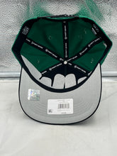 Load image into Gallery viewer, Philadelphia Eagles NFL '47 Throwback Green Script Hitch Snapback Adjustable Hat displayed on a table with other Eagles merchandise.