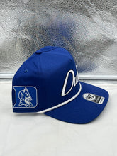 Load image into Gallery viewer, Duke Blue Devils NCAA '47 Brand Blue Script Hitch Rope Adjustable Snapback Hat worn by a fan at a sports event, illustrating team spirit and style.