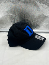 Load image into Gallery viewer, Side perspective of the Duke Blue Devils NCAA '47 Brand Black Clean Up Adjustable Strapback Hat worn by a fan, illustrating its comfortable fit and stylish design.
