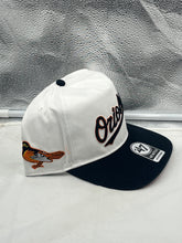 Load image into Gallery viewer, Baltimore Orioles MLB '47 Brand White TT Script Hitch Adjustable Snapback Hat shown from the front angle, showcasing the iconic Orioles script logo and clean white design, perfect for fans.