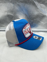 Load image into Gallery viewer, Ole Miss Rebels NCAA '47 Brand Blue Mesh Hitch Rope Adjustable Snapback Hat placed on a table among game day items, illustrating its perfect fit for tailgating events.