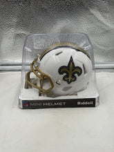 Load image into Gallery viewer, Close-up image of the New Orleans Saints NFL Riddell Speed On-Field Alternate White Mini Helmet, featuring intricate details that highlight its quality as a New Orleans Saints Mini Helmet.