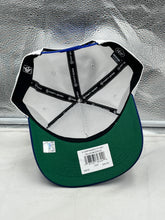 Load image into Gallery viewer, Model wearing the Dallas Mavericks NBA '47 Brand White Script Hitch Snapback Adjustable Hat, perfect for game days and casual outings.