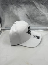 Load image into Gallery viewer, Texas Longhorns NCAA '47 Brand Adjustable Snapback Hat worn by a fan at a football game.