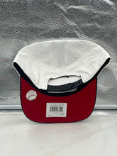 Load image into Gallery viewer, Cleveland Guardians MLB '47 Brand White TT Script Hitch Adjustable Snapback Hat worn by a fan at a baseball game, highlighting team pride and casual athletic style.