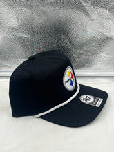 Load image into Gallery viewer, Lifestyle shot of a person wearing the Pittsburgh Steelers NFL '47 Brand Black Rope Hitch Snapback Adjustable Hat, highlighting its comfortable fit during casual outings.