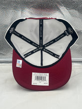 Load image into Gallery viewer, Lifestyle image featuring the Arkansas Razorbacks NCAA '47 Brand Champs White Hitch Adjustable Snapback Hat worn at a game, showcasing fan spirit.