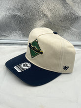 Load image into Gallery viewer, Michigan Wolverines NCAA '47 Brand Natural TT Hitch Adjustable Snapback Hat displayed on a wooden table to showcase its stylish design and bold logo.