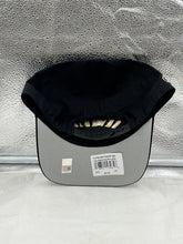 Load image into Gallery viewer, A person wearing the Colorado Buffaloes NCAA '47 Black Reversed Hitch Script Adjustable Snapback Hat in a casual setting, representing team spirit.