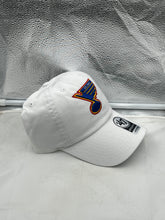 Load image into Gallery viewer, St Louis Blues NHL '47 Brand Throwback White Clean Up Adjustable Strapback Hat shown in outdoor setting, perfect for game day or casual wear.