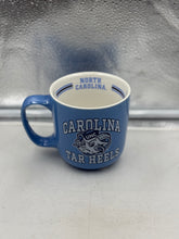 Load image into Gallery viewer, Side view of North Carolina Tar Heels Mug highlighting 15oz capacity and durable ceramic construction for coffee lovers.