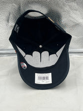 Load image into Gallery viewer, Baltimore Orioles MLB '47 Brand Throwback Black Clean Up Adjustable Hat worn by a fan outdoors demonstrating team spirit and comfort.