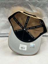 Load image into Gallery viewer, Philadelphia Eagles NFL '47 Throwback Khaki Rope Hitch Snapback Adjustable Hat worn by a fan at a game, demonstrating team spirit.