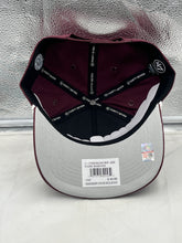 Load image into Gallery viewer, Lifestyle shot of a fan wearing the Mississippi State Bulldogs NCAA '47 Maroon Hitch Rope Adjustable Snapback Hat at a game, emphasizing team spirit and style.