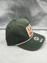 Load image into Gallery viewer, Miami Hurricanes NCAA '47 Brand Green Hitch Adjustable Snapback Hat styled with casual outfits, highlighting its classic design for fans.