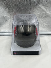 Load image into Gallery viewer, Tampa Bay Buccaneers NFL Riddell Speed Pewter Gray Replica Mini Helmet displayed on a shelf, an ideal addition to any fan's memorabilia collection.
