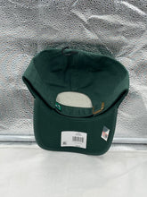 Load image into Gallery viewer, Person wearing the Tulane Green Wave NCAA '47 Brand Green Clean Up Adjustable Strapback Hat while cheering at a sports event, representing team pride.
