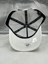 Load image into Gallery viewer, Model wearing the Miami Dolphins NFL '47 Brand White Reversed Script Hitch Snapback Adjustable Hat, illustrating its trendy look suitable for game day or casual outings.