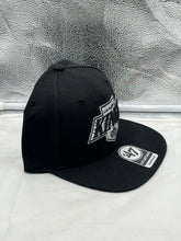 Load image into Gallery viewer, View of the Los Angeles Kings NHL '47 Brand Black Adjustable Captain Snapback Hat from an angle, highlighting its adjustable snapback design and sleek black fabric.
