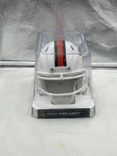 Load image into Gallery viewer, Denver Broncos NFL Riddell Speed White Alternate Replica Mini Helmet positioned on a desk, symbolizing team spirit and loyalty.