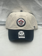 Load image into Gallery viewer, Winnipeg Jets NHL '47 Brand Natural Two Tone Clean Up Adjustable Strapback Hat displayed on a plain background, showcasing the stylish two-tone design.