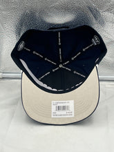 Load image into Gallery viewer, Side view of the Notre Dame Fighting Irish NCAA '47 Brand Navy Rope Script Hitch Adjustable Hat with adjustable strap shown, emphasizing its fashionable design.