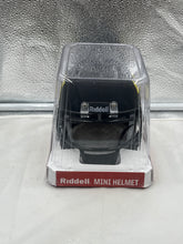 Load image into Gallery viewer, Oregon Ducks NCAA Riddell Speed Black Mini Helmet elegantly displayed in an office setting, symbolizing school spirit and team pride.