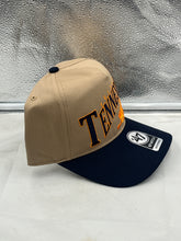 Load image into Gallery viewer, Tennessee Volunteers NCAA '47 Throwback Khaki TT Hitch Snapback Adjustable Hat flat lay displaying the khaki fabric and vintage style.