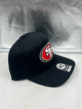 Load image into Gallery viewer, San Francisco 49ers NFL '47 Brand Black Hitch Snapback Adjustable Hat worn by a fan, demonstrating a comfortable fit.